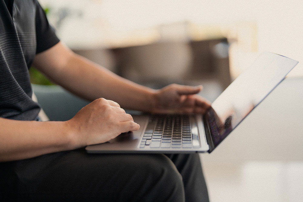 Laptop on person's lap